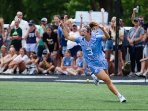Fifth year attacker Jamie Ortega (3) celebrates after scoring a goal during UNC's NCAA Tournament Championship Final against Boston College at Homewood Field in Baltimore, Md. on Sunday, May 29, 2022. UNC won 12-11.