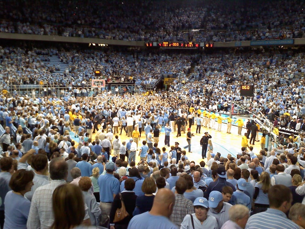 	<p><span class="caps">DTH</span> / Eric Pesale</p>

	<p><span class="caps">UNC</span> students rush onto the Dean E. Smith Center court to celebrate the men&#8217;s basketball team&#8217;s 81-67 victory over Duke University on March 5th.</p>