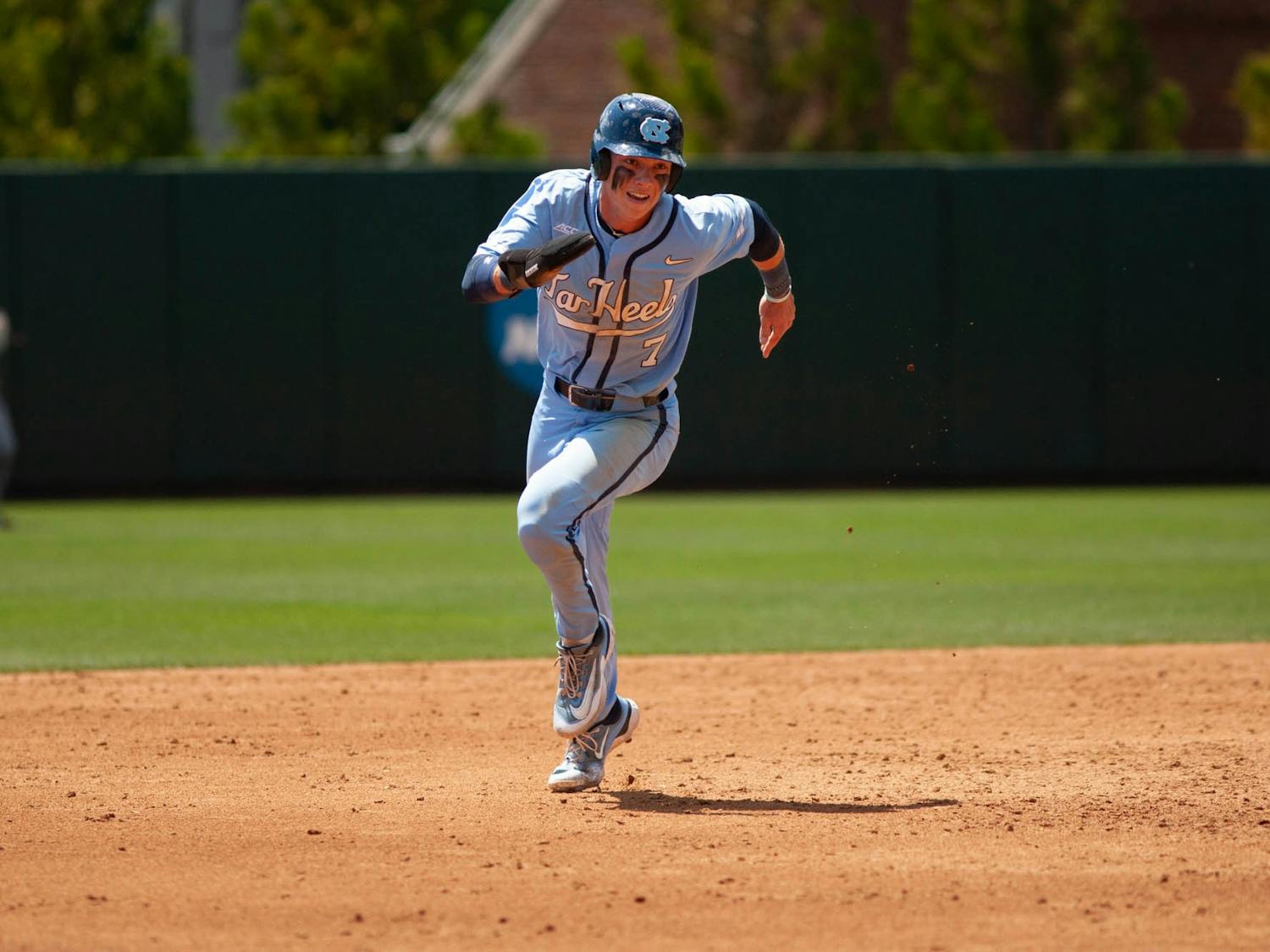 Sophomore outfielder Vance Honeycutt (7) runs to third base during the baseball game against Boston College on Sunday, April 23, 2023, at Boshamer Stadium. UNC fell to Boston College 2-6.