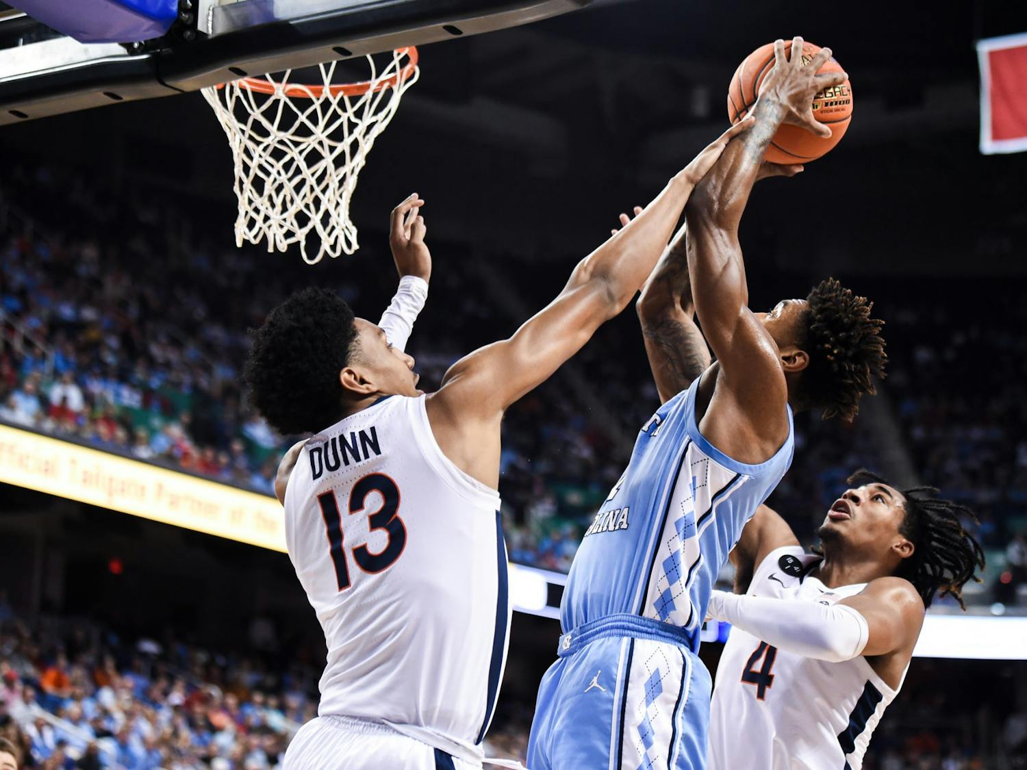 UNC graduate forward Leaky Black (1) goes for a dunk during the game against Virginia in the ACC Tournament Quarterfinals at Greensboro Coliseum on March 9, 2023. UNC fell to Virginia 68-59.