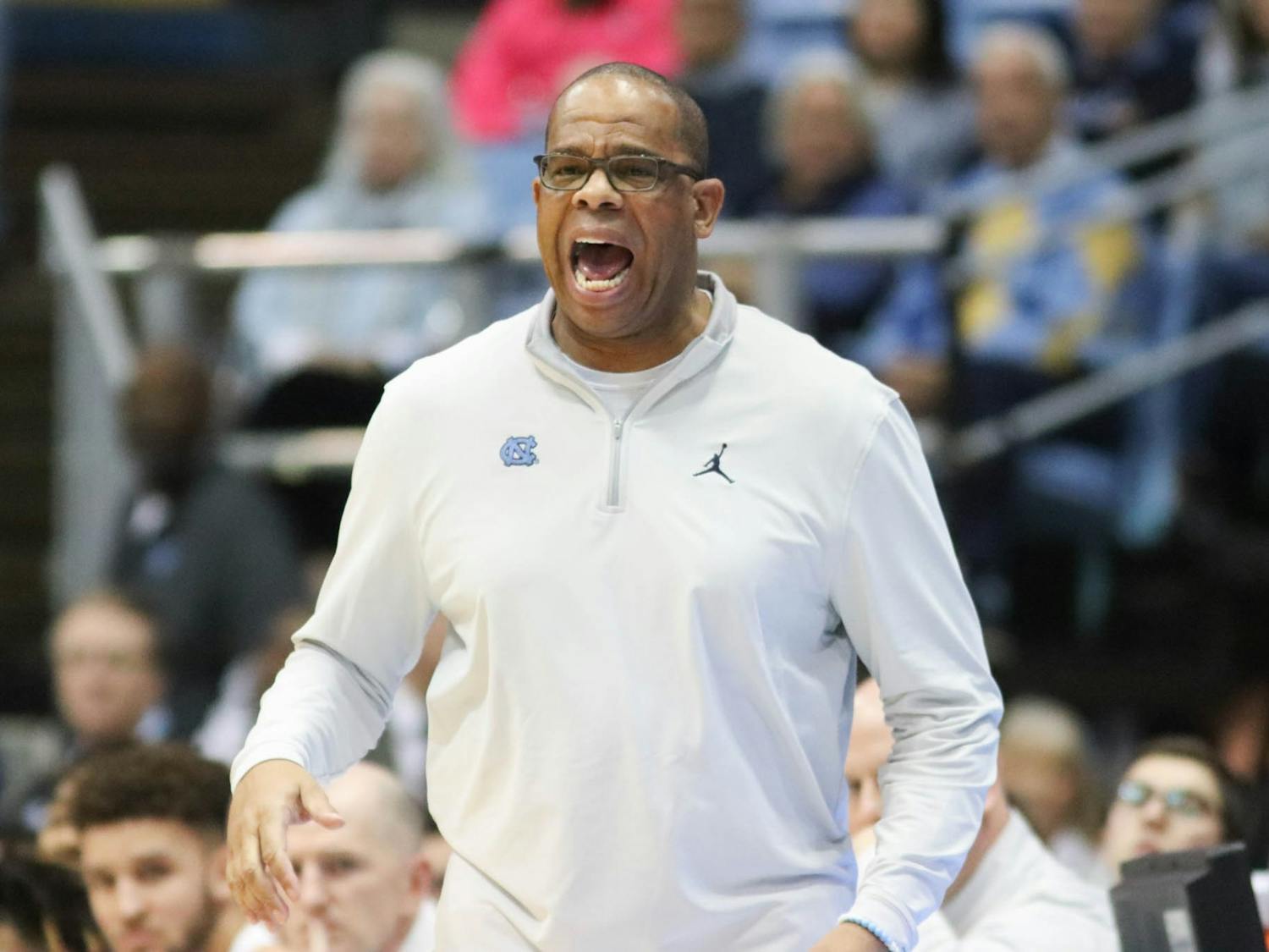 UNC Basketball Head Coach Huber Davis yells from the sideline during the men's basketball game against The Citadel at the Dean Smith Center on Tuesday, Dec. 13, 2022. UNC beat The Citadel 100-67.
