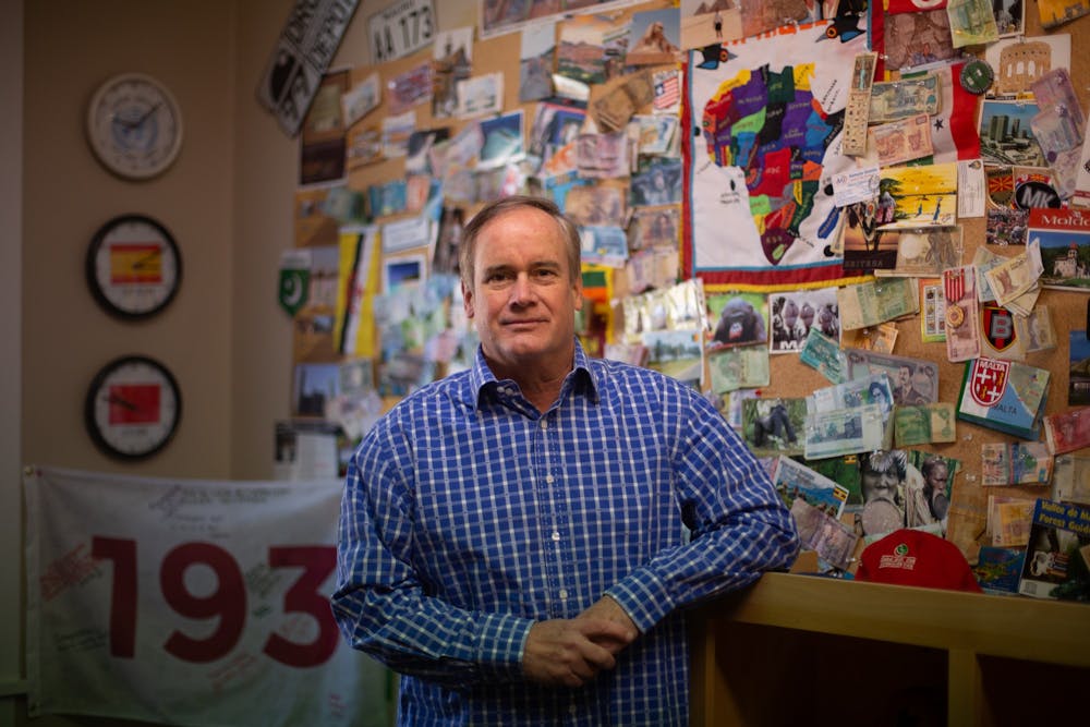 Jim Kitchen poses for a portrait in his office on Franklin Street on Tuesday, Feb. 23, 2021. Kitchen has visited all 193 countries recognized by the United Nations and wants to go to space next.