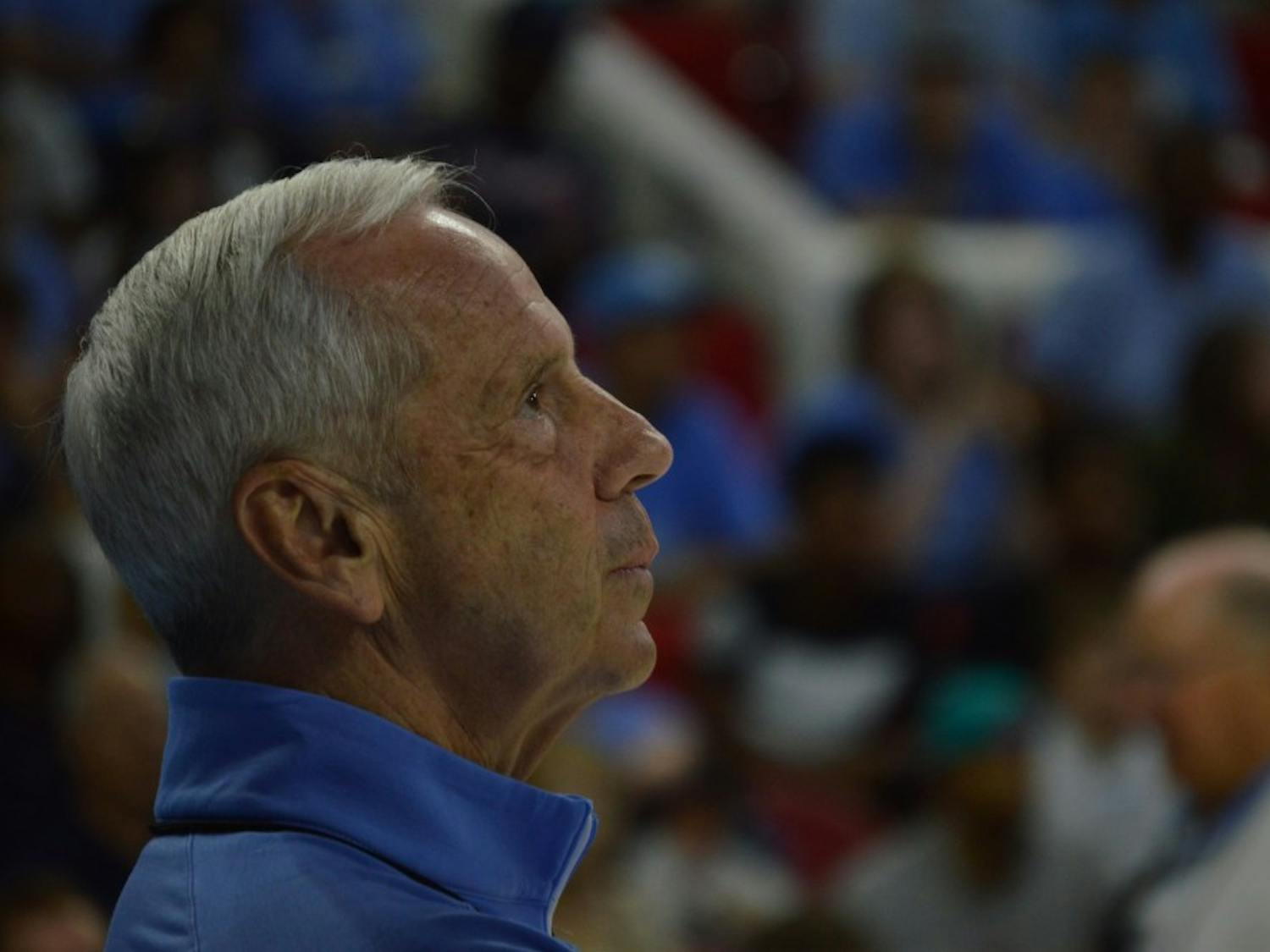 Coach Roy Williams looks at the scoreboard during the North Carolina men's basketball team's practice at PNC Arena in Raleigh on Wednesday.