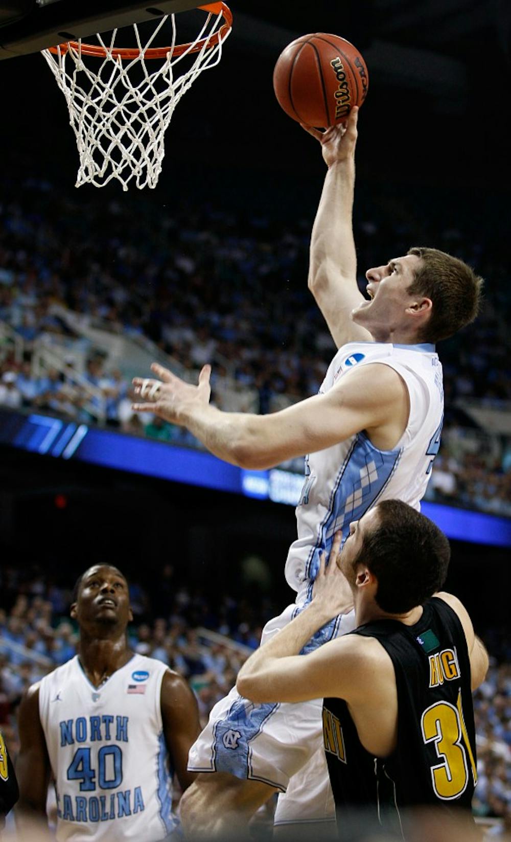 UNC forward Tyler Zeller shoots the ball during the first half in the game against Vermont. Zeller had 17 points in the Tar Heels 77-58 win over Vermont in the second round of the NCAA tournament at the Greensboro Coliseum on Friday, March 16, 2012.