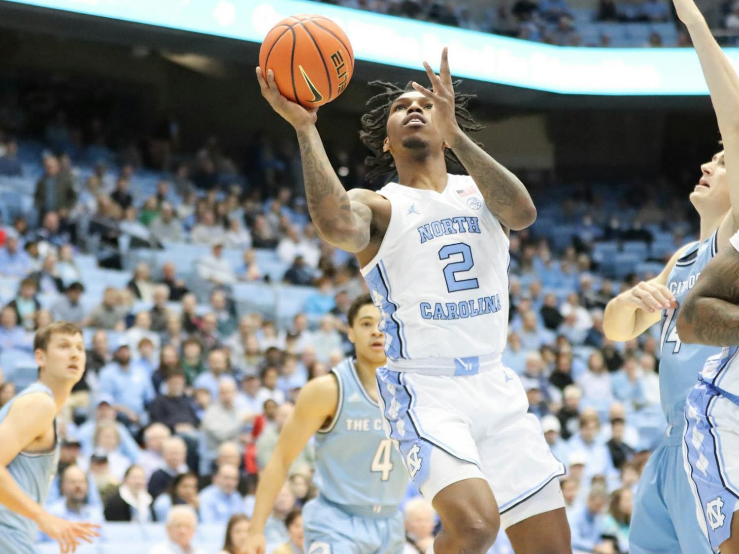 UNC junior guard Caleb Love (2) shoots a layup men's basketball game against The Citadel at the Dean Smith Center on Tuesday, Dec. 13, 2022. UNC beat The Citadel 100-67.