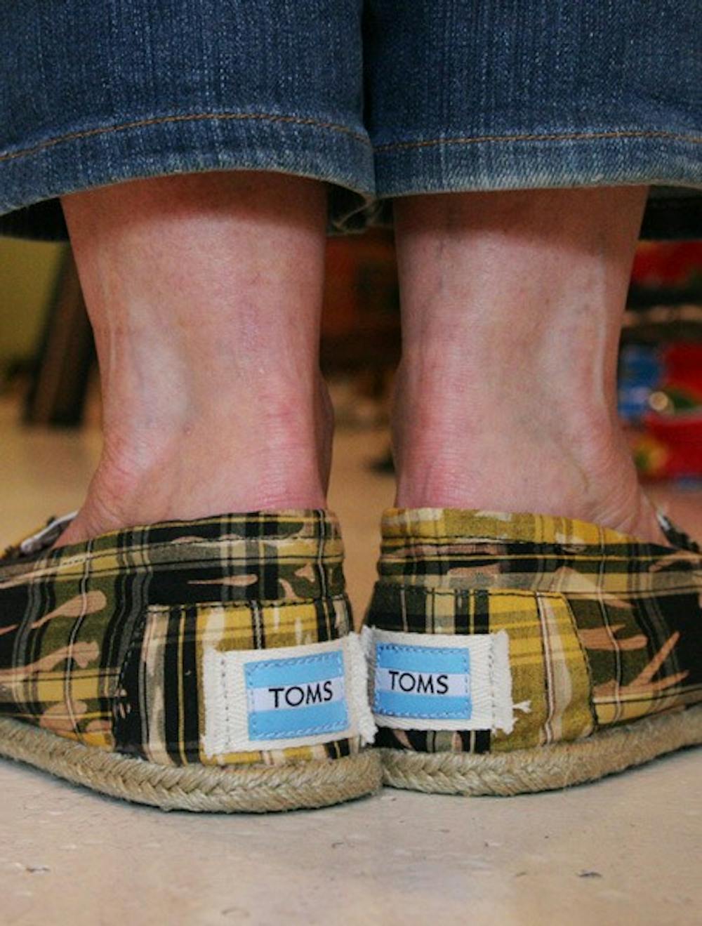 Today, many students will be wearing their TOMS shoes in an attempt to promote the company. DTH File/Kim Martiniuk