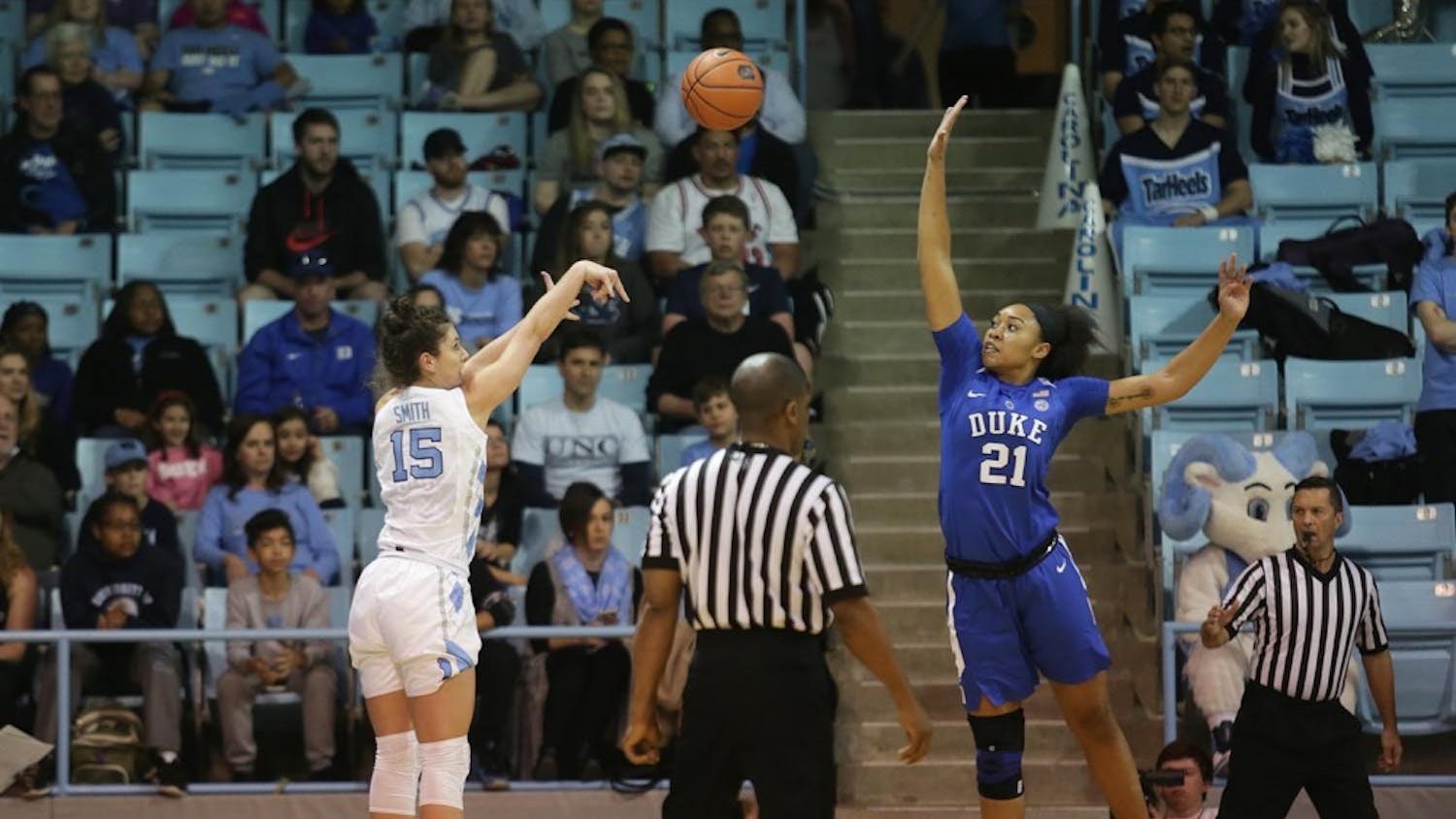 Olivia Smith (15)  shoots a three against Duke's Kendall Cooper (21) Sunday afternoon.