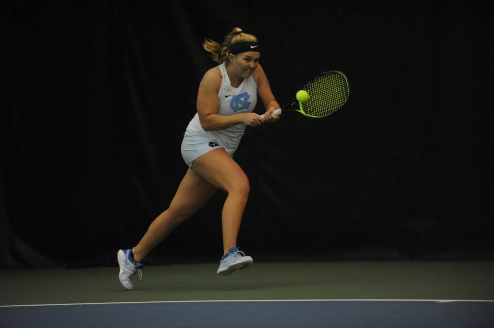 <p>UNC women's tennis sophomore Alele Sanford prepares to return a ball during a singles match against Louisville on Sunday, March 3, 2019. UNC won the match against the Cardinals.&nbsp;</p>