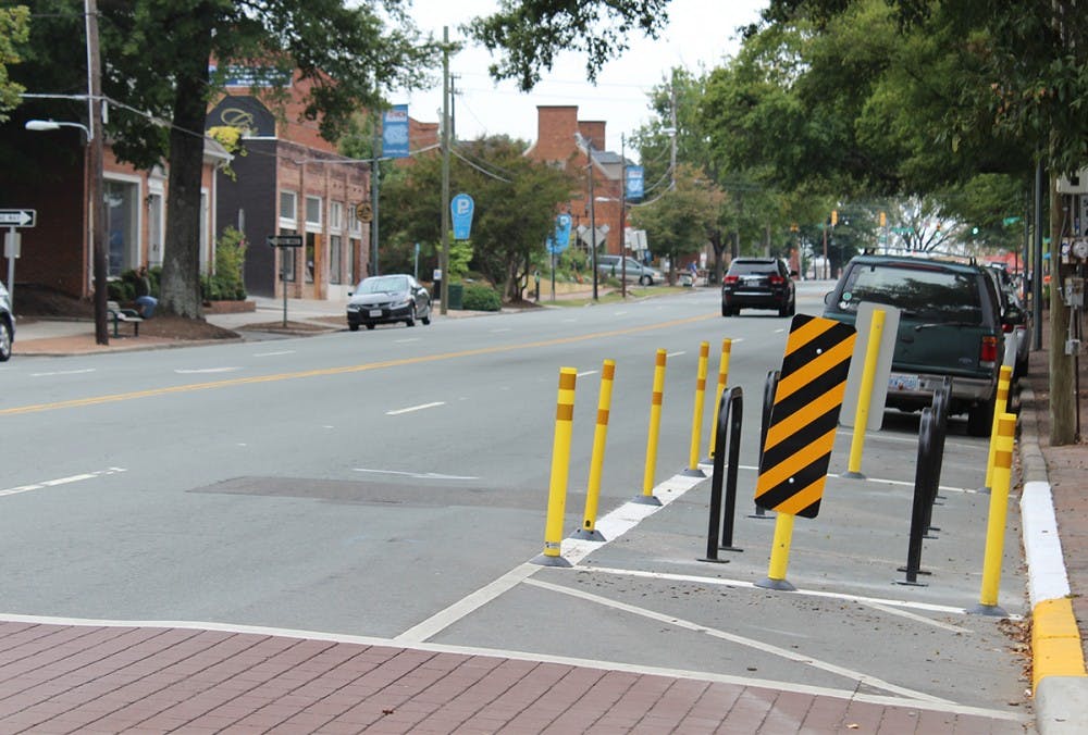 A biking corral has replaced a parking space on West Franklin Street. 