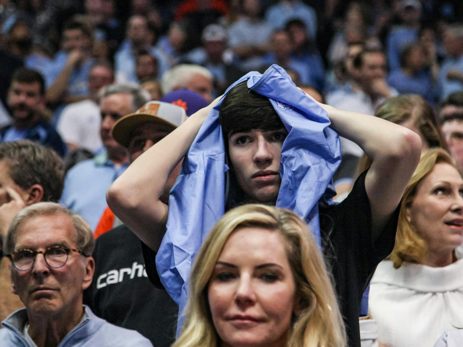 Fans reacts to UNC's loss to Clemson during a game at the Dean Smith Center on Saturday, Jan. 11, 2020. Clemson defeated UNC for the first time in Chapel Hill 79-76.