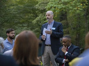 Alan Parry (center), Political Chair of the NC Sierra Club, delivers a welcoming speech at the organization's PAC Fundraiser on Thursday, Sept. 26, 2019 in Chapel Hill. Blake Fleming (left), lead organizer of the NC Sierra Club, and Rep. Robert Reives II (right), NC House member, also spoke at the event.
