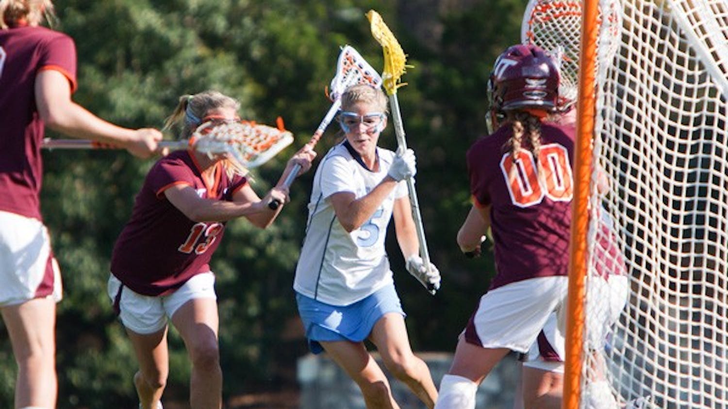 Senior attacker Kristen Taylor slices her way through the Virginia Tech defense looking to score a goal. DTH/Phong Dinh