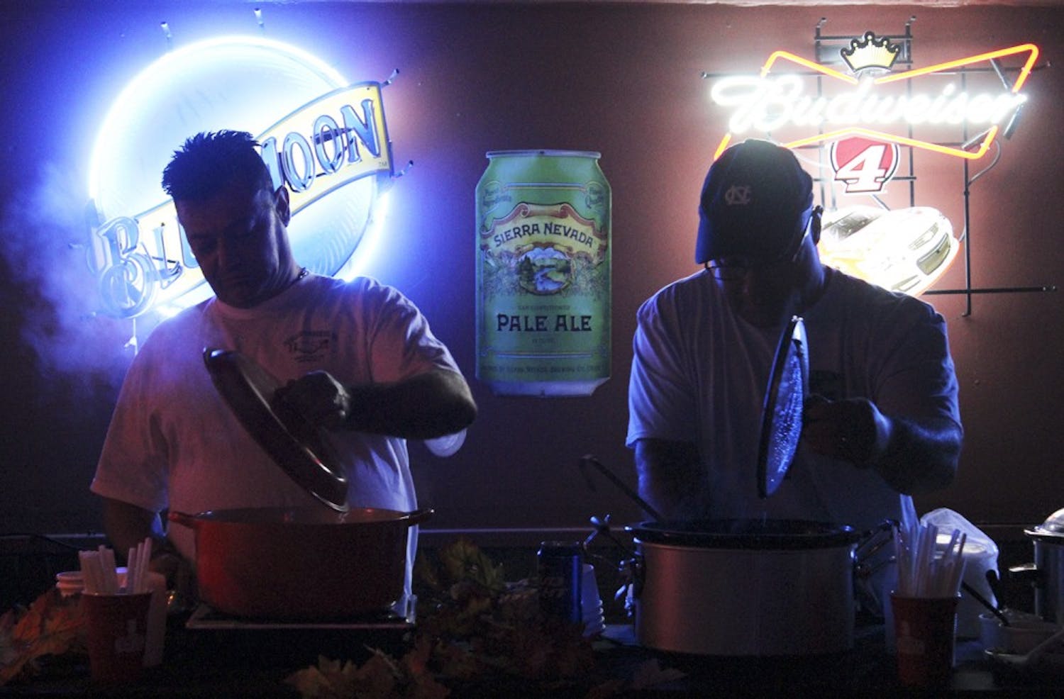 Angelo Marrone and Al Bowers serve up their chili for tasting at the Chili Throwdown at Country Fried Duck.

Angelo Marrone: Italian Style Chili
Al Bowers: The Khaleesi

