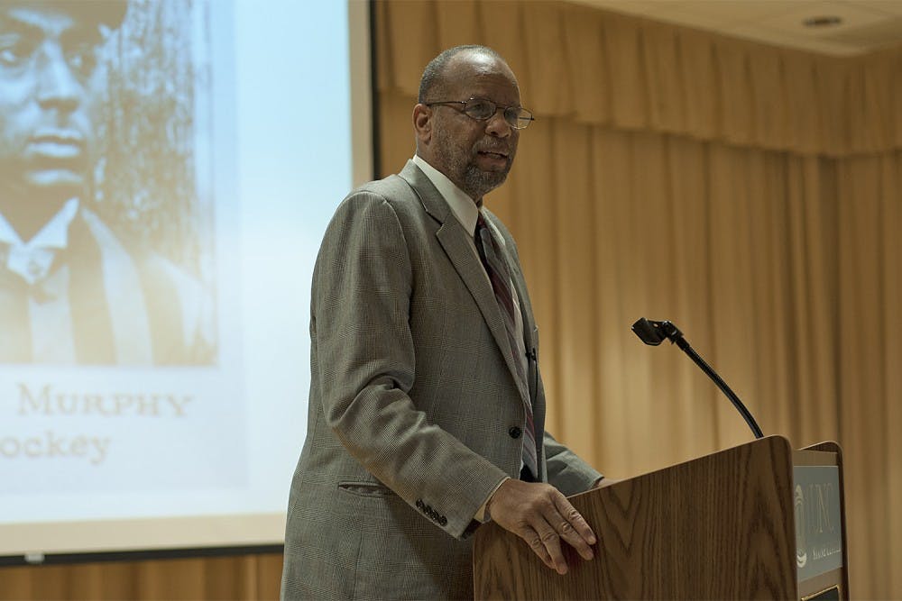 "I'm here because I want to continue Professor Stone's legacy, to keep this vibrant center open, and to challenge the members of the football and basketball teams to be vigilant," said William Rhoden in the Stone Center for Black Culture and History Thursday night in his Diaspora lecture.