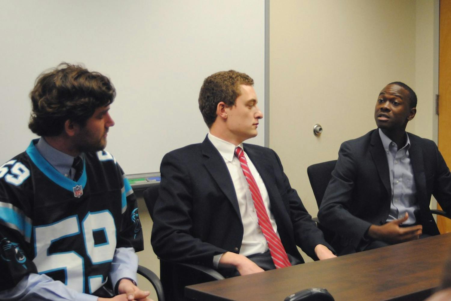 Wilson Sink (left), John Taylor (center) and Bradley Opere (right) pictured during the Daily Tar Heel's Student Body President Forum.