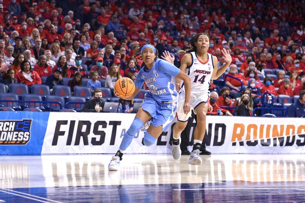 Sophomore guard Kennedy Todd-Williams (3) drives the ball to the basket during the second round of NCAA Tournament against University of Arizona in Tucson, Arizona, on Monday, March 21, 2022.