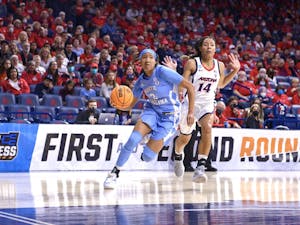 Sophomore guard Kennedy Todd-Williams (3) drives the ball to the basket during the second round of NCAA Tournament against University of Arizona in Tucson, Arizona, on Monday, March 21, 2022.