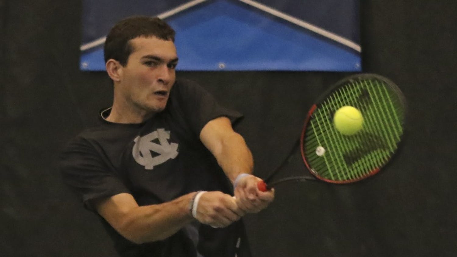 UNC first-year William Blumberg returns a volley during his singles match on Saturday against Bucknell.
