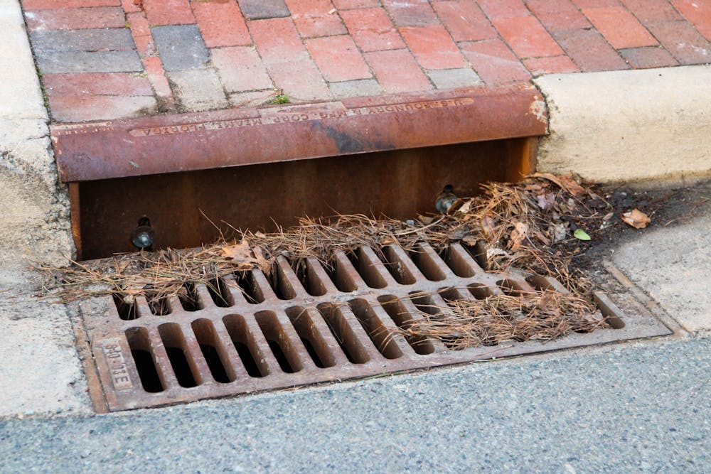 A storm drain in Chapel Hill collects water and dirt at a Chapel Hill intersection.