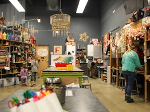 Children and parents get creative in the "Maker's Room" at Kidzu Children's Museum on Sunday, Nov. 18. The museum will soon move to a new location near Southern Village in Chapel Hill, N.C.