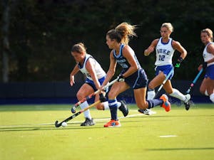 Yentl Leemans (18) races Duke player Haley Schleicher (10) for ball in a field hockey game at Karen Shelton Stadium on Friday Oct. 4, 2019. UNC won 2-0, marking their 33rd consecutive victory.