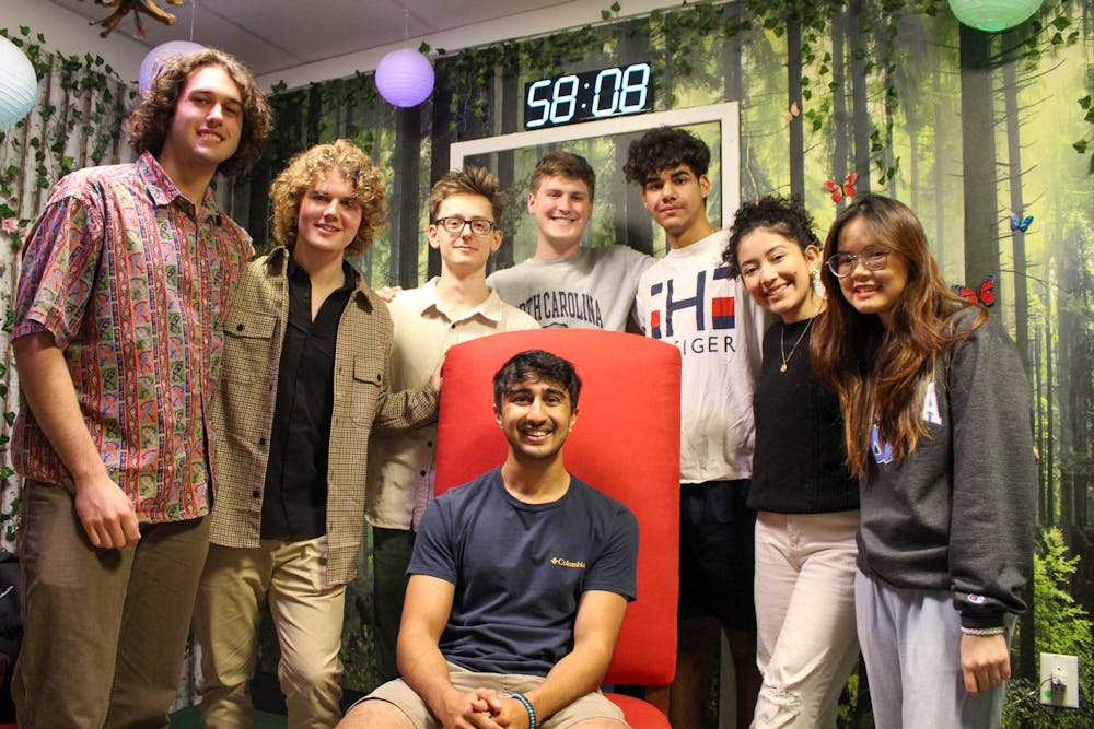 <p>Leaders of Chapel Thrill Escapes pose for a photo inside of the escape room on Jan. 29, 2023. It is the first student-run, student-built escape room at UNC-Chapel Hill.</p>