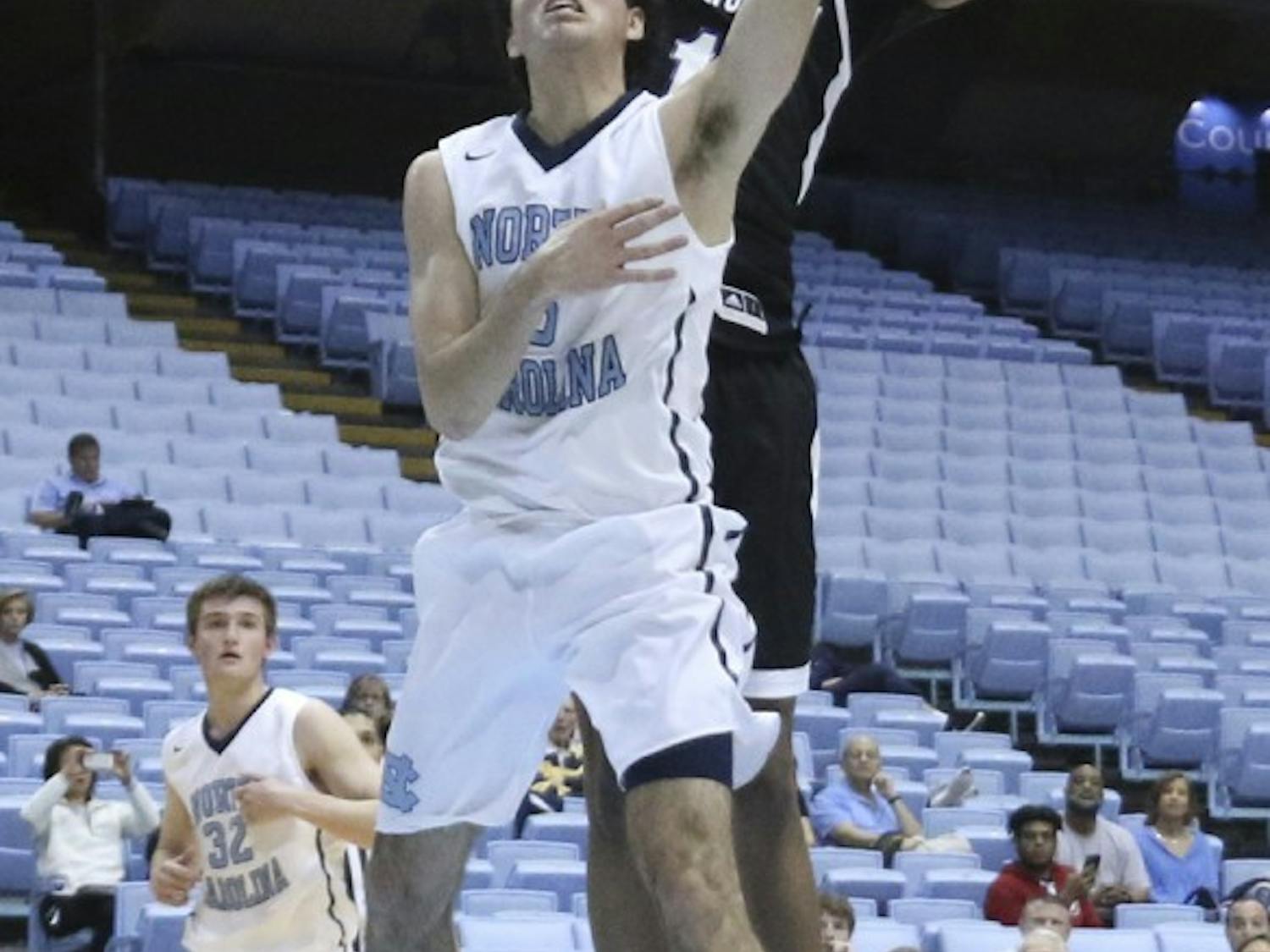 North Carolina guard Robbie O'Hare (5) lays in the ball&nbsp;against Massanutten on February 22nd.