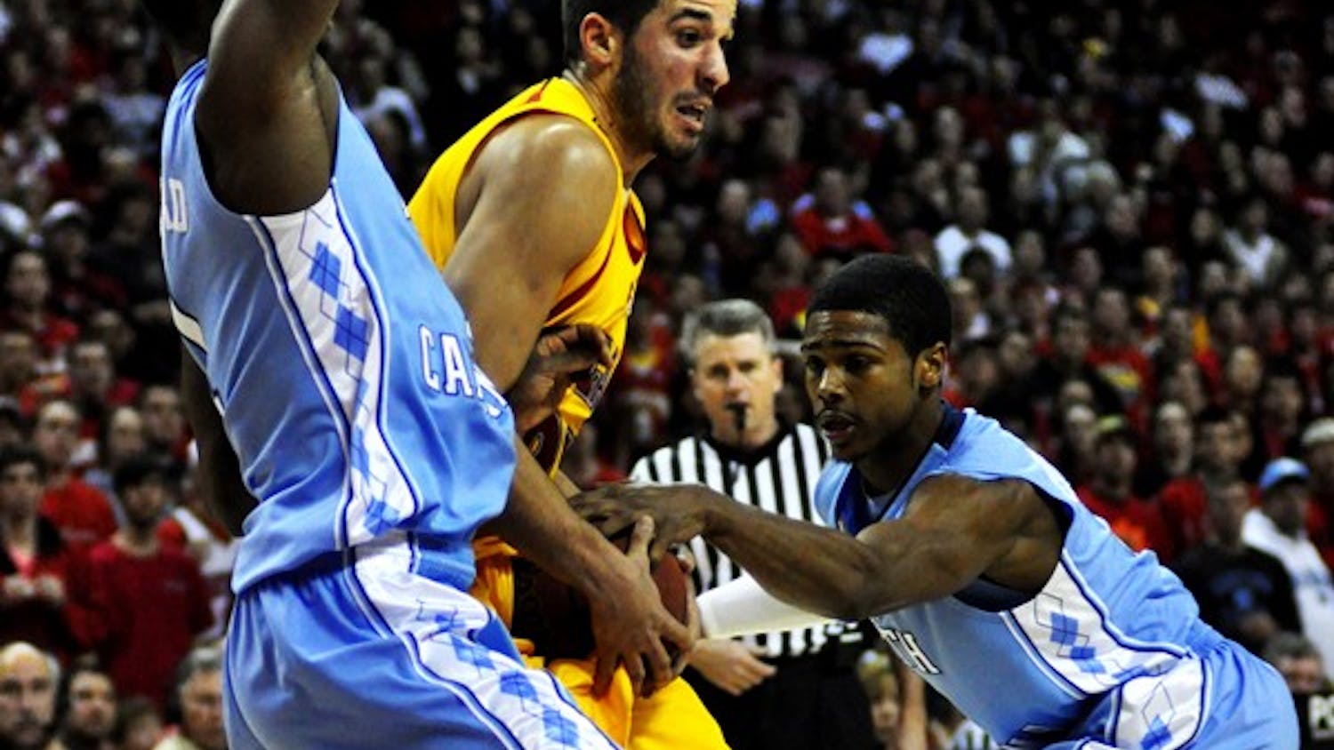 Dexter Strickland attempts to strip the ball from Maryland's Greivis Vasquez. Courtesy of Jaclyn Borowski/The Diamondback
