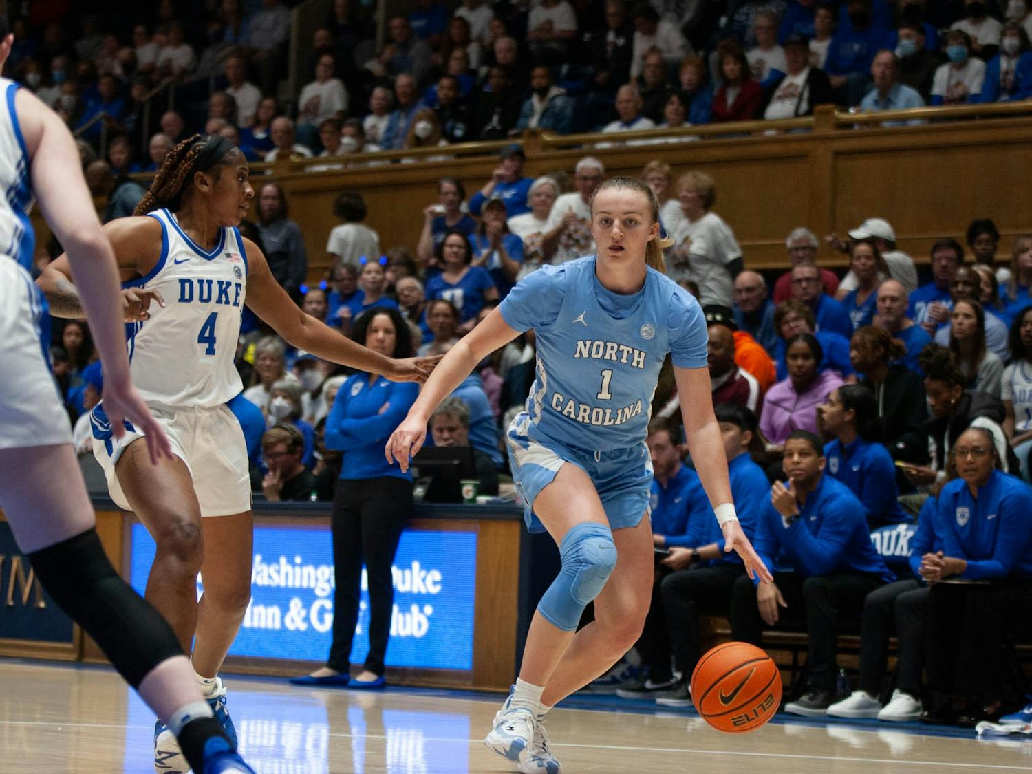 UNC junior guard Alyssa Utsby (1) dribbles the ball during the women’s basketball game against Duke on Sunday, Feb. 26, at Cameron Indoor Stadium. UNC defeated Duke 45-41, and will try and earn its third win over the Blue Devils in the ACC Tournament on Friday.&nbsp;