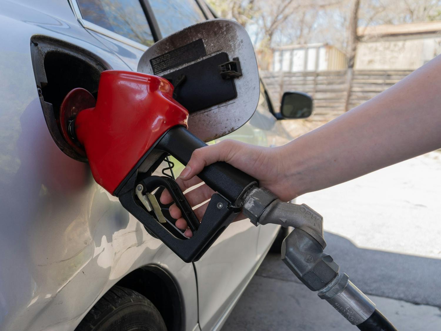 DTH Photo Illustration. Orange County residents are grappling with rising gas prices.&nbsp;