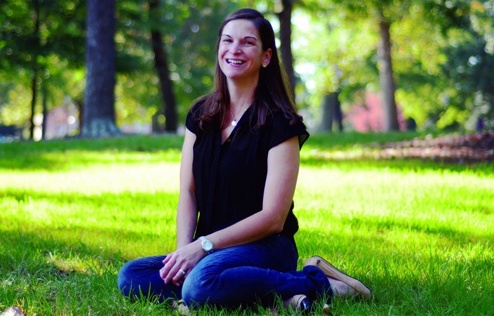 Sarah Dessen, author, poses in McCorkle Place. Dessen graduated as an English Major. UNC still feels like home to Dessen, despite graduating many years ago. "I feel like I only just left."
