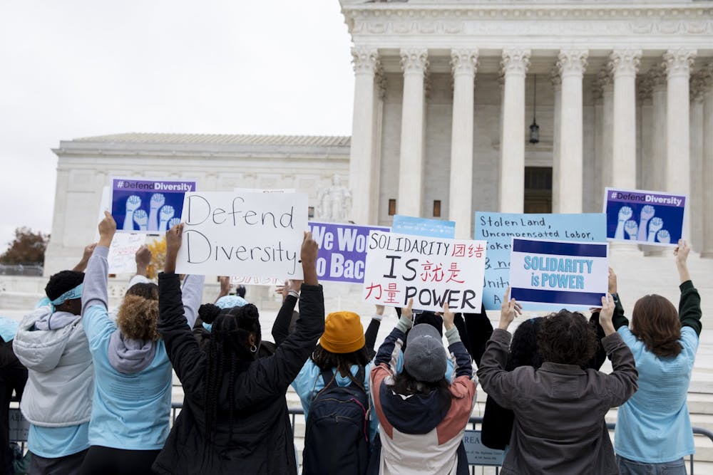 Protesters gather outside of the Supreme Court of the United States before oral arguments in Students for Fair Admissions, Inc. vs. the University of North Carolina on Monday, Oct. 31, 2022.