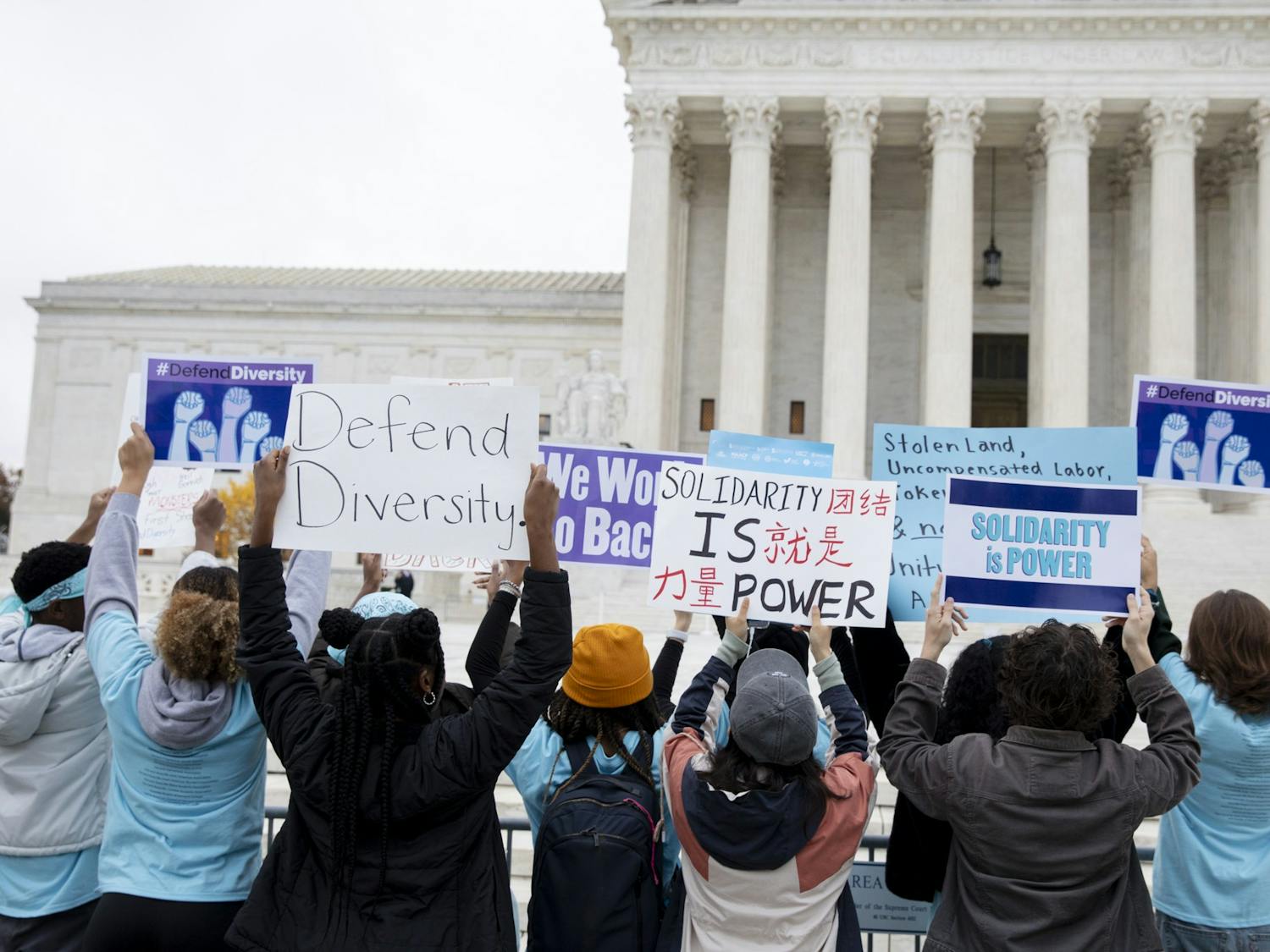 Protesters gather outside of the Supreme Court of the United States before oral arguments in Students for Fair Admissions, Inc. vs. the University of North Carolina on Monday, Oct. 31, 2022.