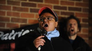 Maya Little speaks before a shouting crowd during a protest against Chancellor Carol Folt and the Board of Trustees' proposal for Silent Sam's relocation in the Peace and Justice Plaza on Monday, Dec. 3, 2018.&nbsp;