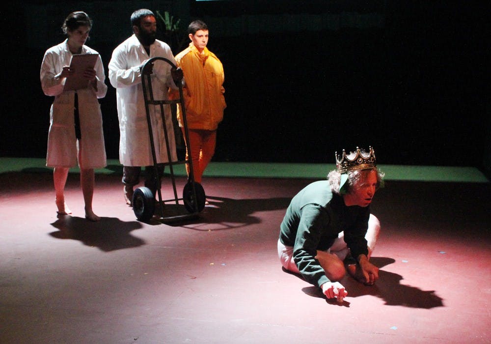 	Cameron Ayres (right), playing the character of Lamb, rehearses a scene in which he is approached to receive treatment.  