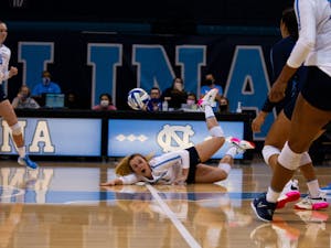 Graduate setter Meghan Neelon passes a succesful pancake to her teammates. In an intense match, the Tar Heel volleybal team defeated Colorado State in overtime during the game on Sept. 3 in Chapel Hill.