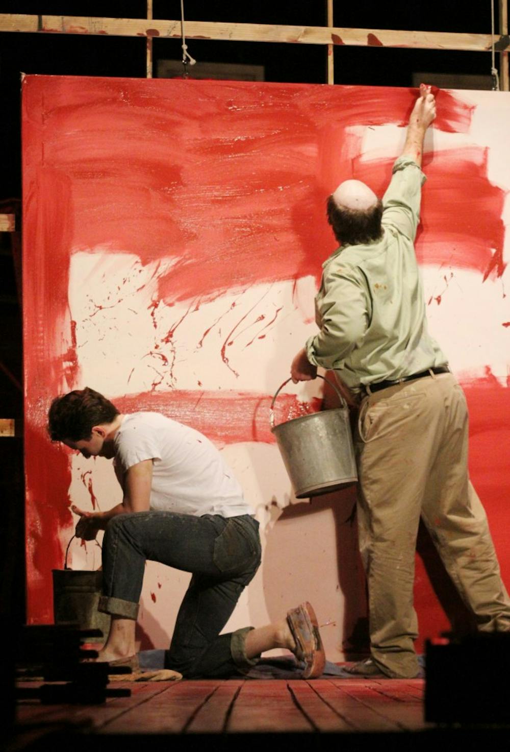 RED-- STEPHEN CAFFREY (bald/old) as Rothko and MATT GARNER (young) as Ken in they PlayMakers Repertory Company's production of "Red"  by John Logan.