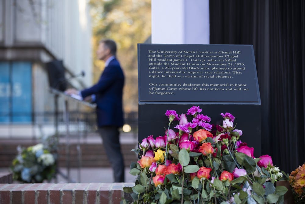 Chancellor Kevin Guskiewicz speaks at the dedication of the memorial for James Lewis Cates, Jr. on Monday, Nov. 21, 2022.