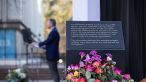 Chancellor Kevin Guskiewicz speaks at the dedication of the memorial for James Lewis Cates, Jr. on Monday, Nov. 21, 2022.