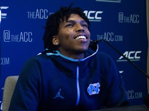 UNC sophomore guard Caleb Love smiles at the 2021 ACC Men's Basketball Tipoff in Charlotte, NC on Oct. 12.