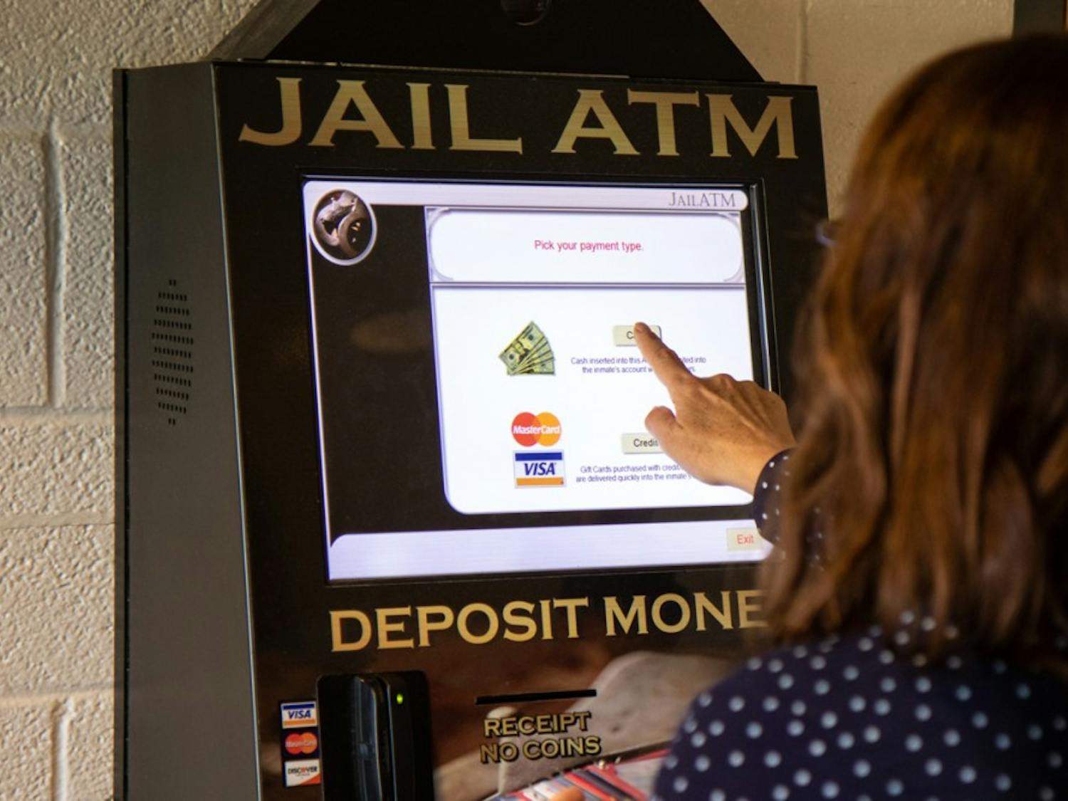 The Orange County Detention Center recently decided to remove the required fees from its ATM. 