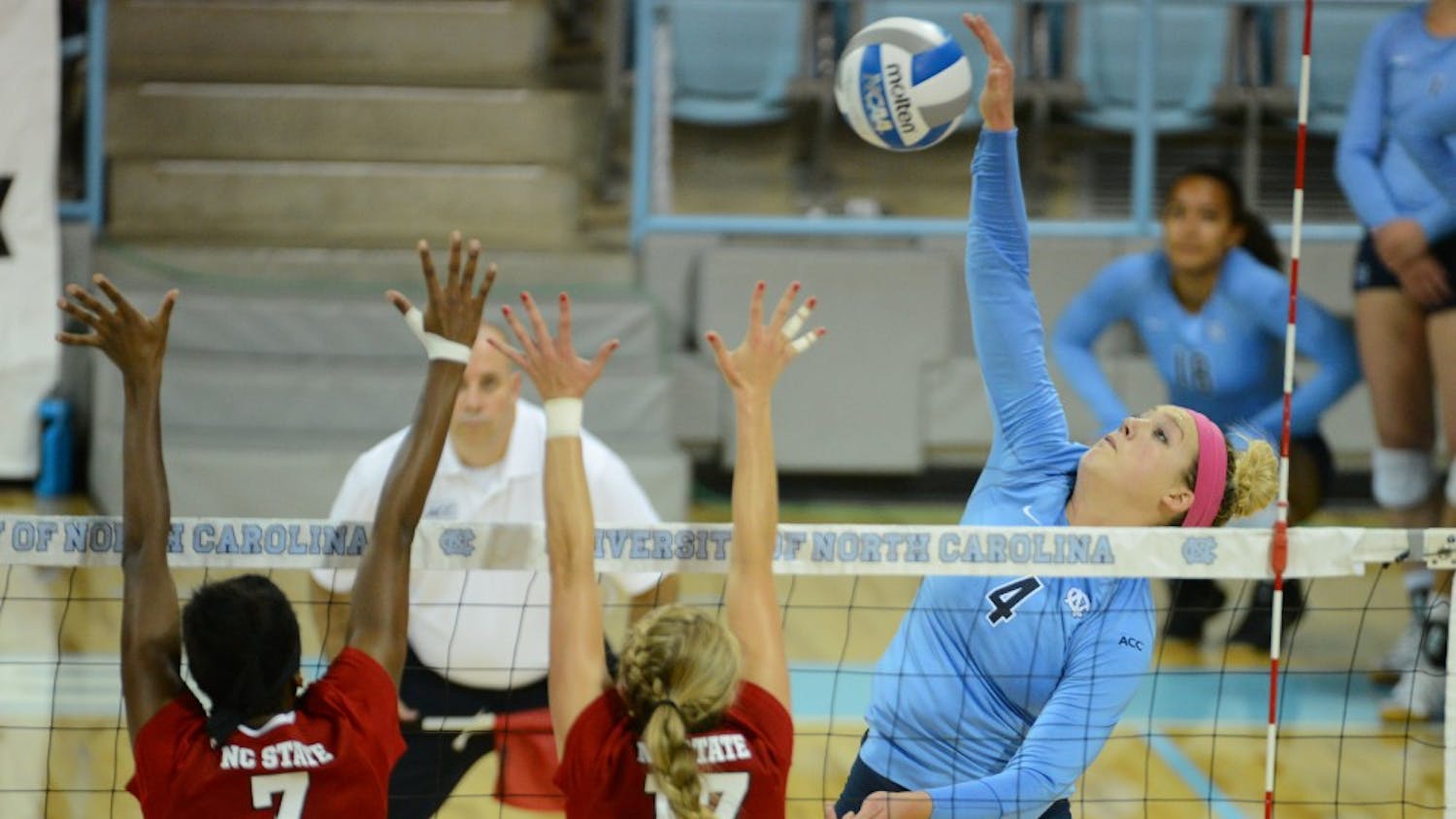 UNC outside hitter Leigh Andrew (4) hits the ball.