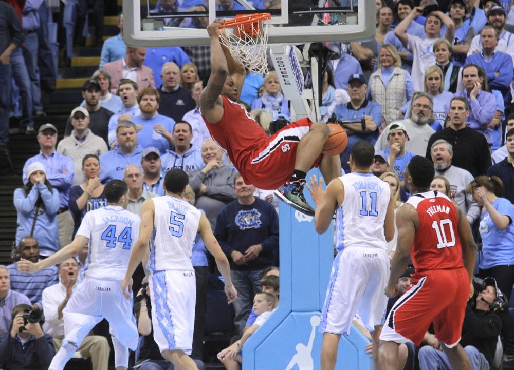 BeeJay Anya (21) dunks over the UNC defense for two of his five points. 