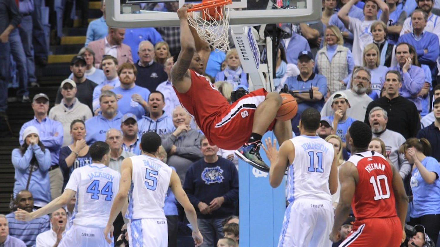 BeeJay Anya (21) dunks over the UNC defense for two of his five points. 