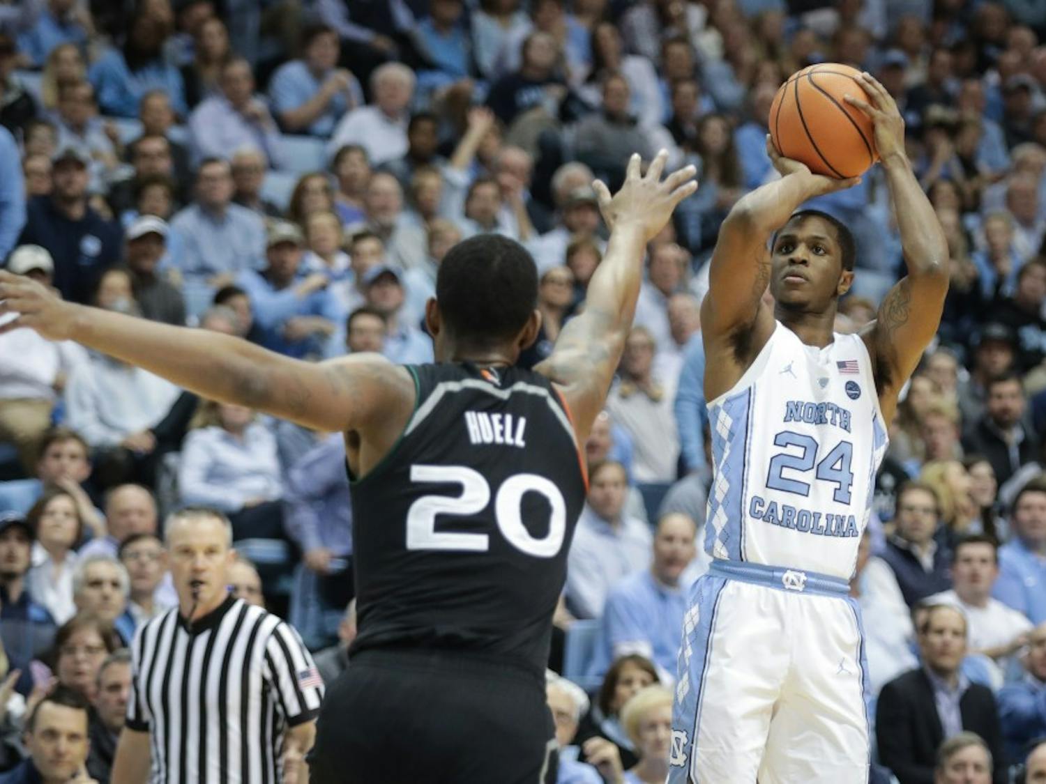 North Carolina guard Kenny Williams (24) shoots a 3-pointer during the first half on Feb. 27 at the Smith Center.