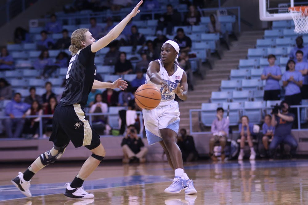 <p>Guard Jamie Cherry (10) passes the ball during a game against Colorado on Sunday afternoon in Carmichael Arena.</p>