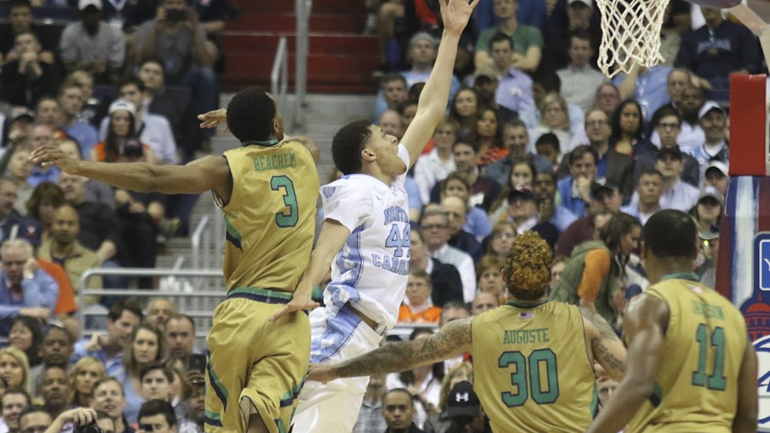 UNC wing Justin Jackson (44) lays in the ball against Notre Dame in the 2016 men's basketball&nbsp;ACC Tournament semi-finals in March 2016. The Tar Heels taking on the Fighting Irish Saturday,&nbsp;the first time since that matchup.