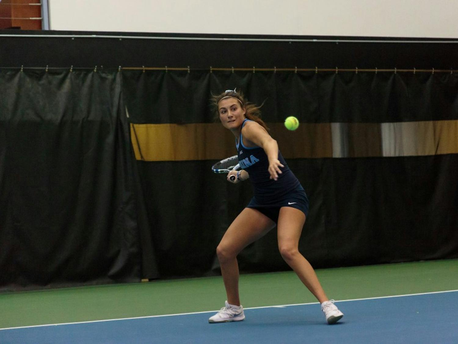 Alexa Graham winds up to hit the ball during a singles match against Georgia Tech on Saturday..