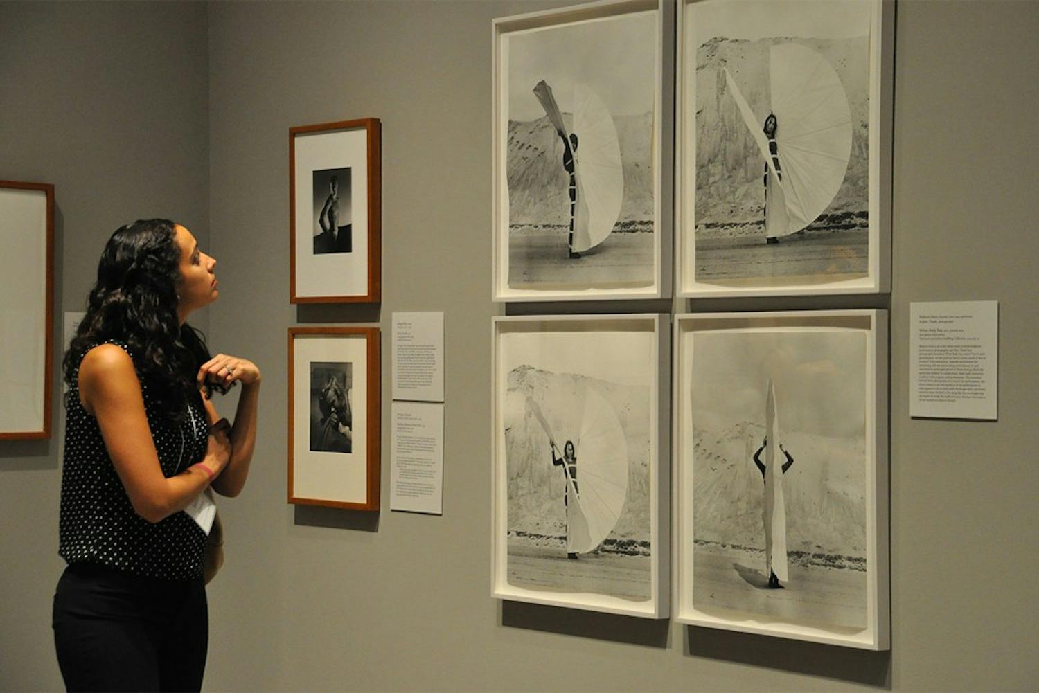 Ackland Art Museum opened its exhibit "PhotoVision" on Thursday, Sept. 18, 2014. The exhibit featured around 150 photographs tracing the history of photography from the nineteenth century to the twenty-first century. Above is Sarada Schossow, a guest at the opening.