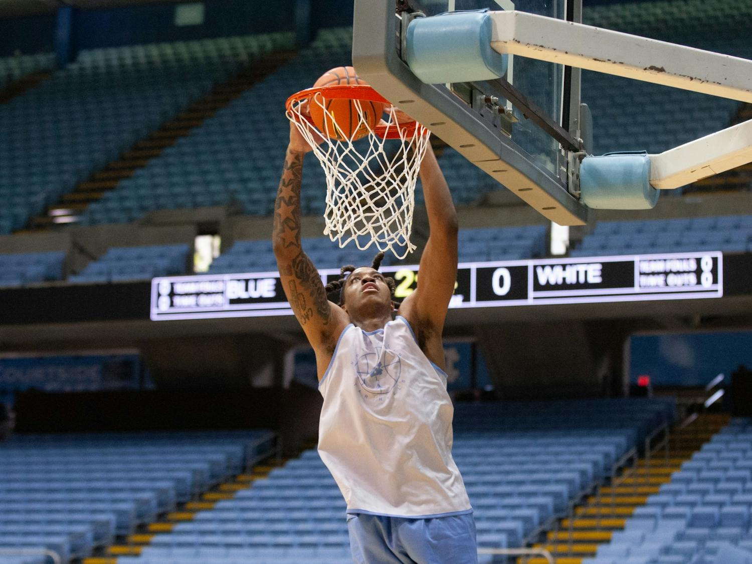The North Carolina men’s basketball team held its second official practice under head coach Hubert Davis on Wednesday afternoon, which featured plenty of new faces. Most notably, transfers Justin McKoy, Brady Manek and Dawson Garcia saw some of their first action in Tar Heel uniforms. Playing a modified form of traditional UNC basketball was a point of emphasis throughout the practice, as the team ran the floor and focused on knocking down shots from a distance.